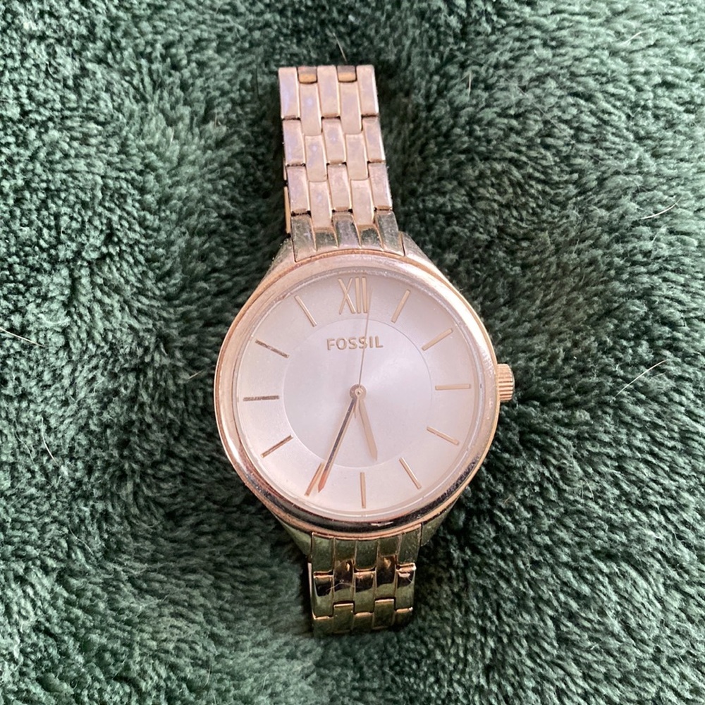 Gold fossil watch
